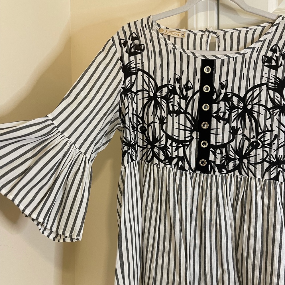 Black white and silver shirt , flare